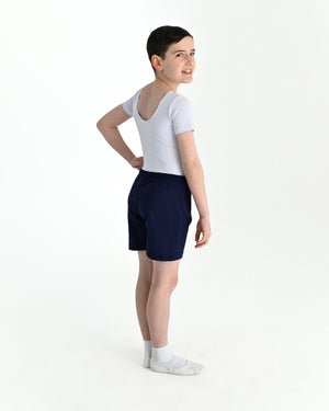 Young dancer wearing the Essential Boys Basic Dance Shorts in Navy, alternate view