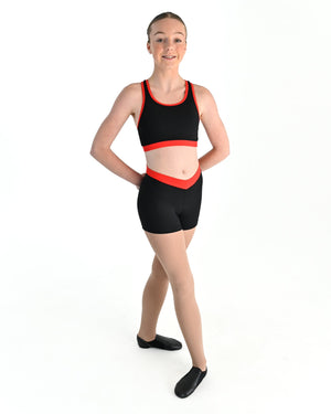 Young dancer wearing the Violet crossed back dance crop top with contrast binding in Red