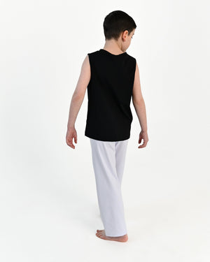 Young dancer wearing the Essential Boys Straight Leg Dance Pant in White, alternate view
