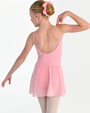 Young dancer wearing the Chiffon Pull-On Ballet Wrap Skirt in Pink, alternate view