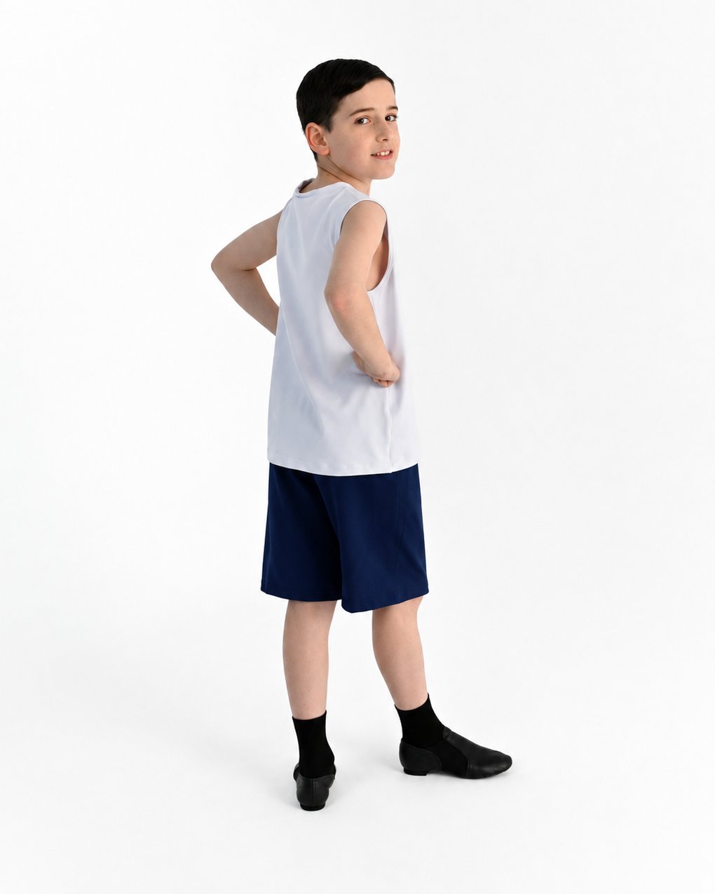 Young dancer wearing the Essential Boys Casual Dance Shorts in Navy