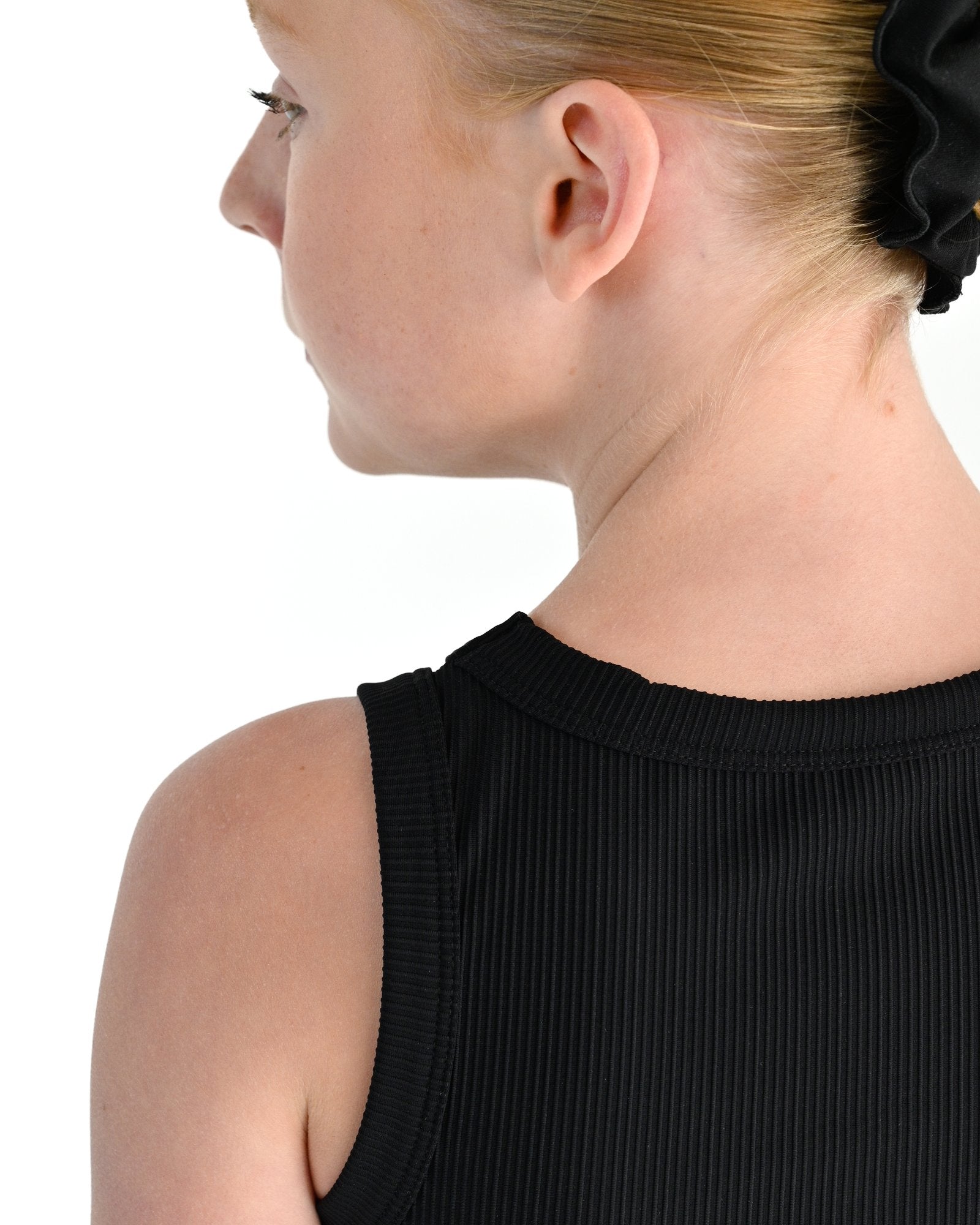 Young dancer wearing the Ribbed high neck dance singlet in Black, alternate view